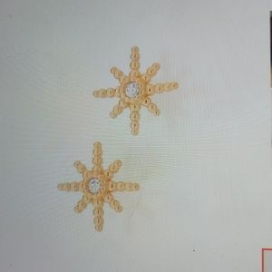 Gold sun rays earrings